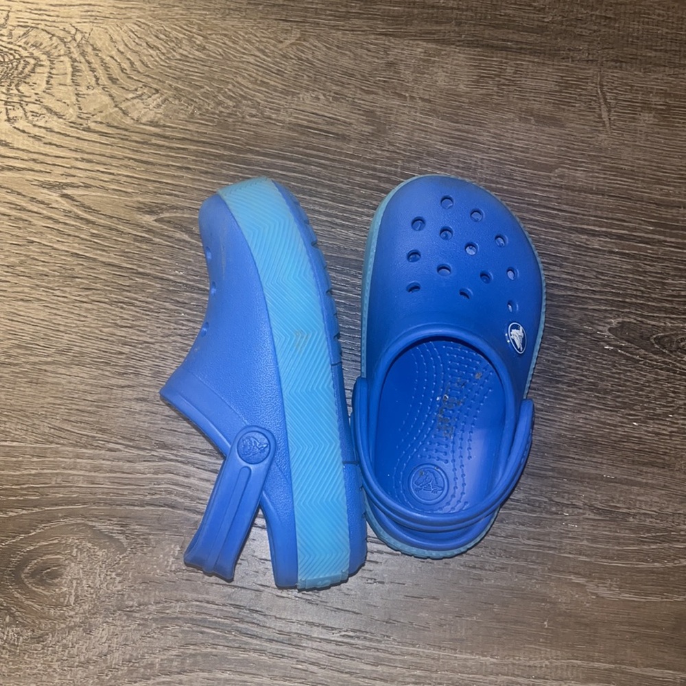 Blue kids crocs size 8 (one shoe lights up) platform crocs